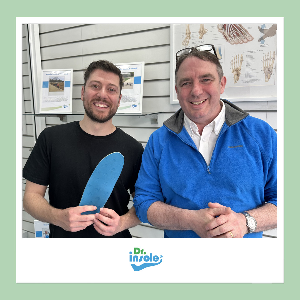 Gary and Andrew smiling together after a successful orthotics appointment with Dr Insoles.