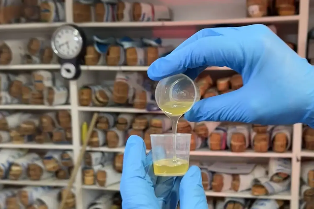Technician mixing urethane flexi foam to create the correct density for a customer’s custom orthotic insoles at Dr Insole.