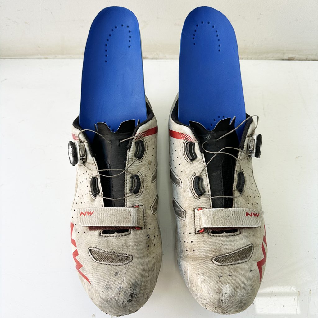 Hand-made custom foam cycling insoles fitted inside cycling shoes